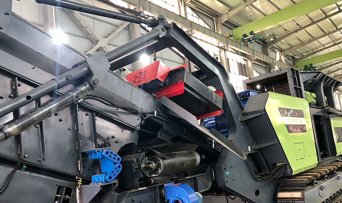 China. Overband magnet in mobile crusher site